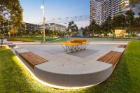 Illuminated concrete and timber benches at Docklands Park